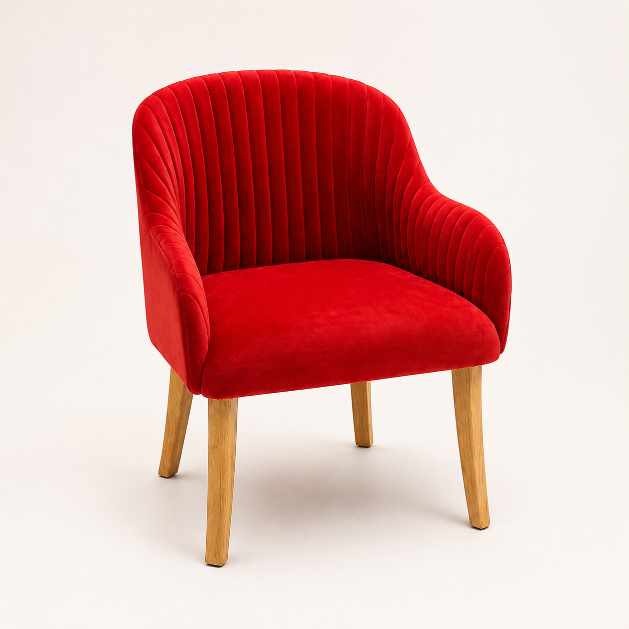 Red velvet armchair with natural wood legs